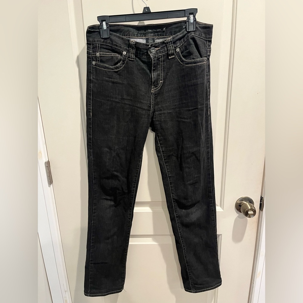 Dark grey Calvin Klein jeans in size 8